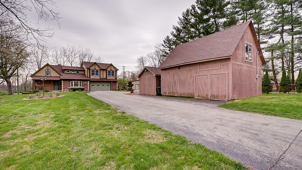 Front Exterior and Outbuilding