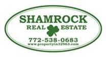 Shamrock Real Estate Corp. Logo