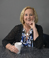 Julie Scott, Broker