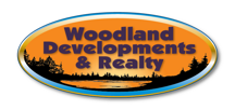 Woodland Developments & Realty Logo